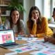 A vibrant e-commerce workspace featuring a laptop with a colorful Shopify interface, surrounded by customizable product samples, and a group of smiling individuals discussing ideas, with a bright and welcoming atmosphere.